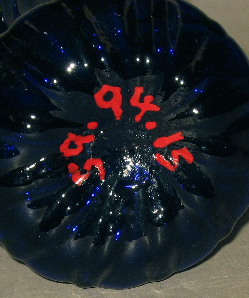 1959.0094.015 Glass jug (underside)