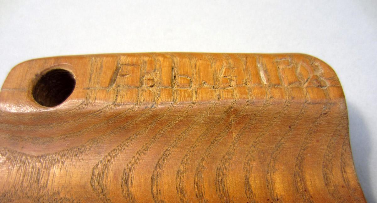 2012.0024.161 Comb, Inscription