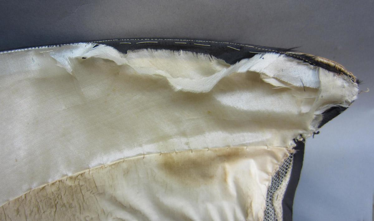2012.0024.189 Bonnet, Lost stitches