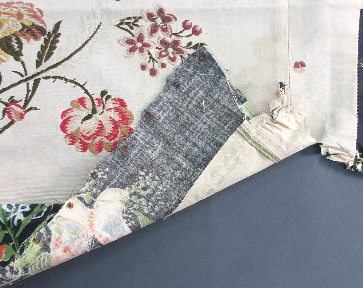 1952.0174 E Textile, woven folded corner