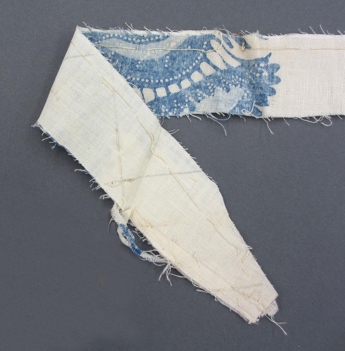 1969.8241.017 Textile, printed folded corner