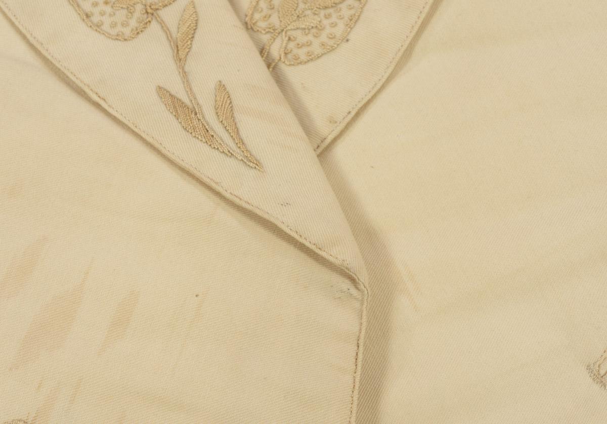2012.0017 Waistcoat, detail 1, before conservation treatment