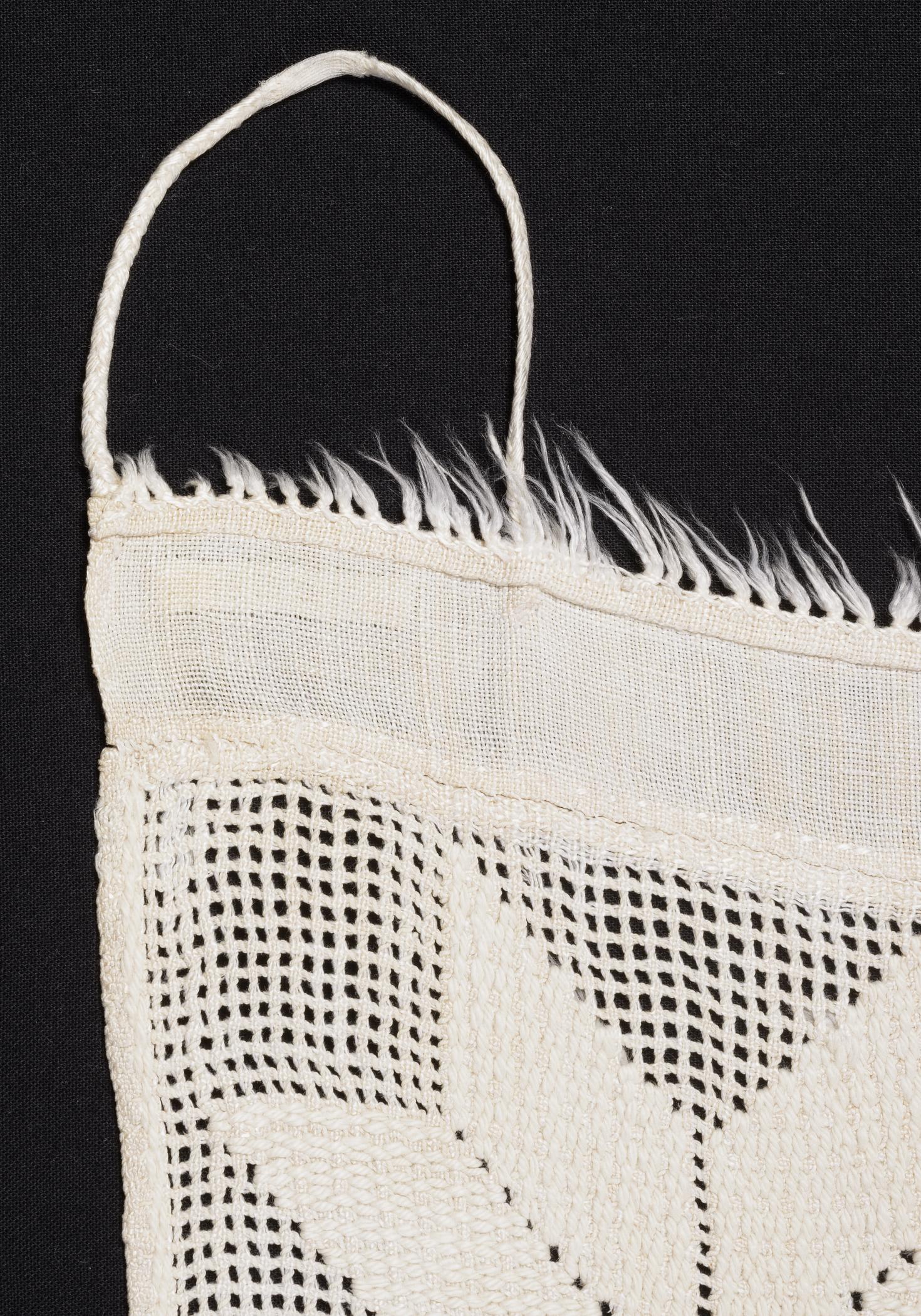 2013.0031.163 Towel, detail 1, after conservation treatment
