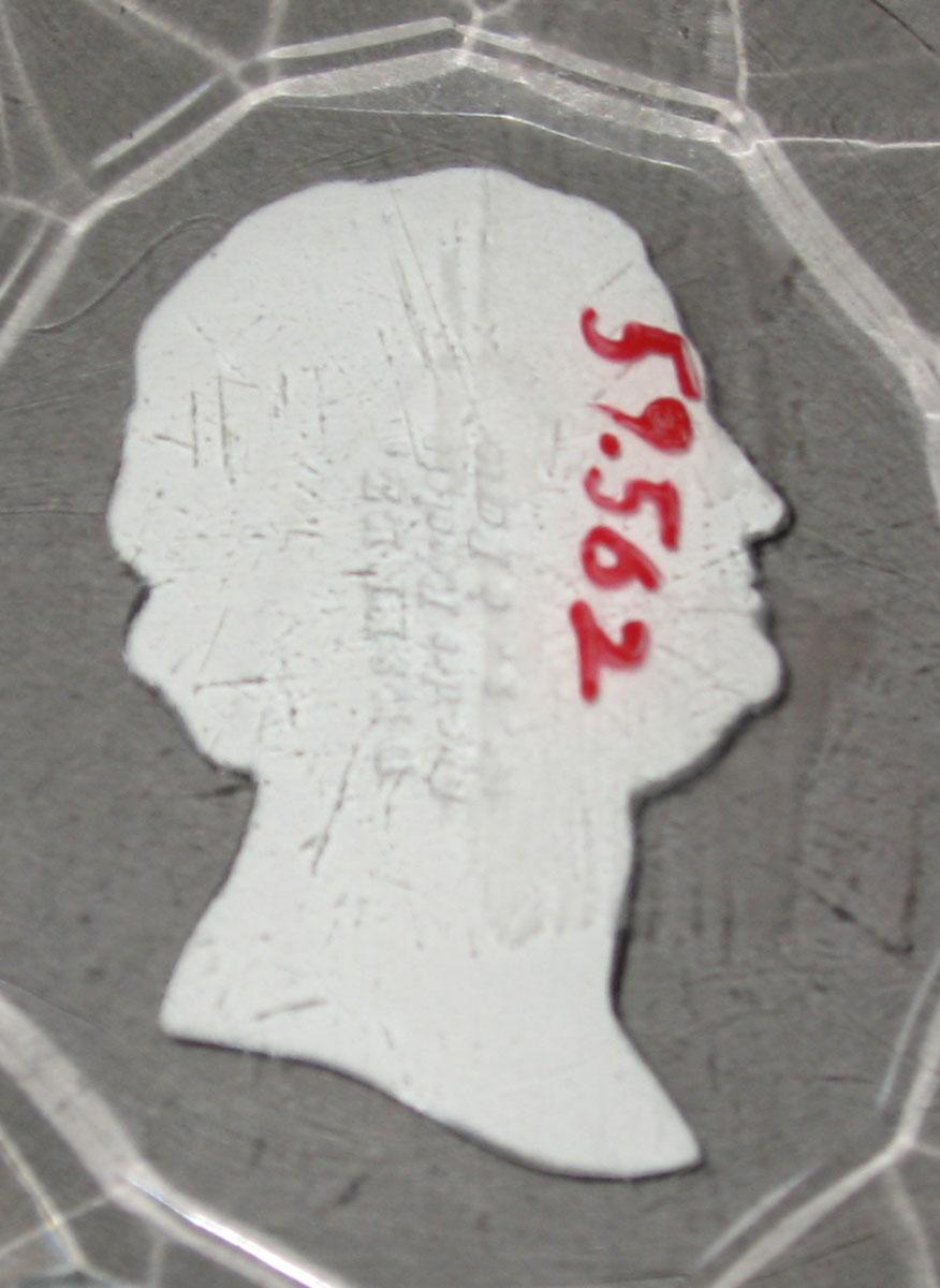1959.0562 Glass and sulphide portrait plaque (underside)