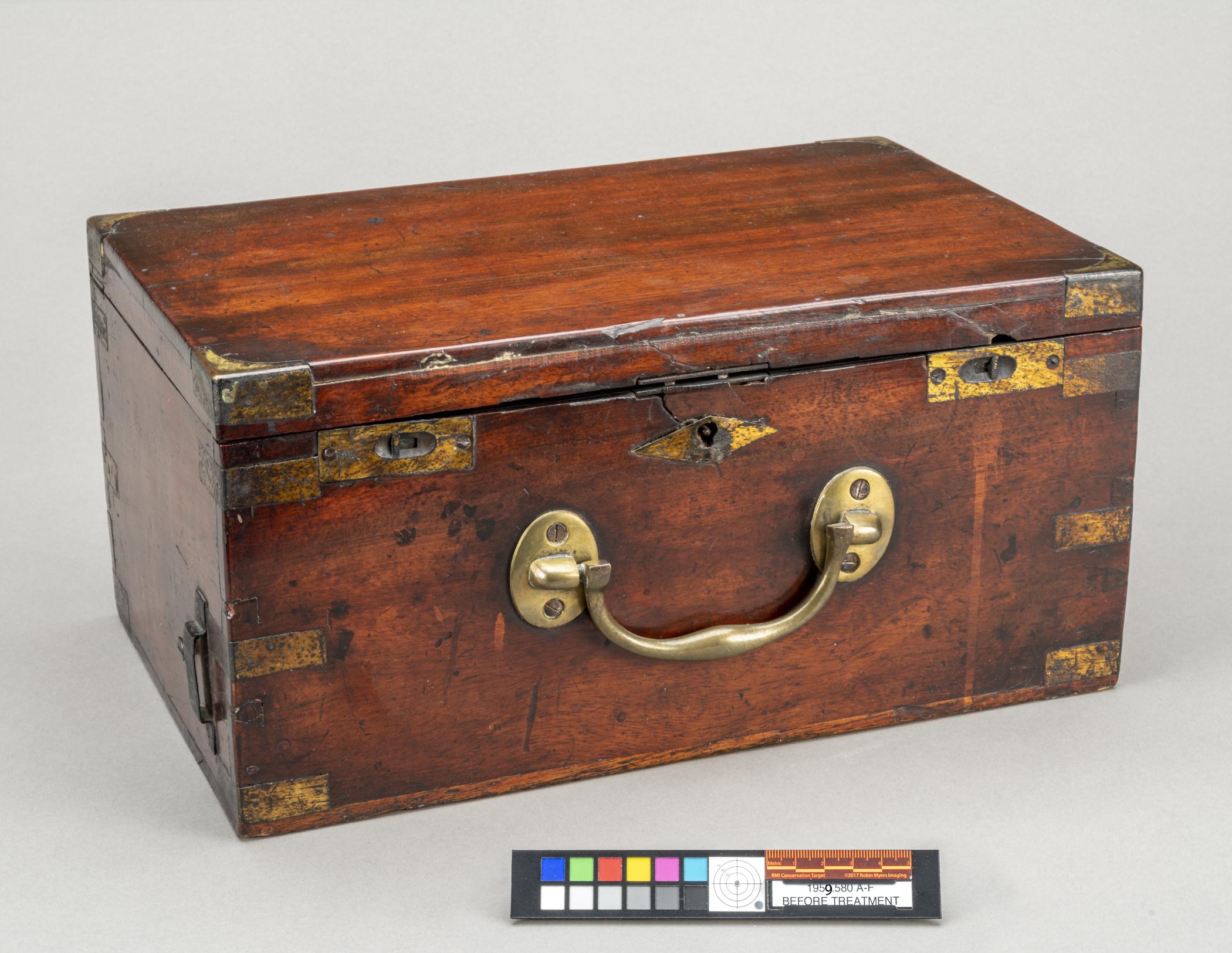 1959.0580 A Box, view 1, before conservation treatment