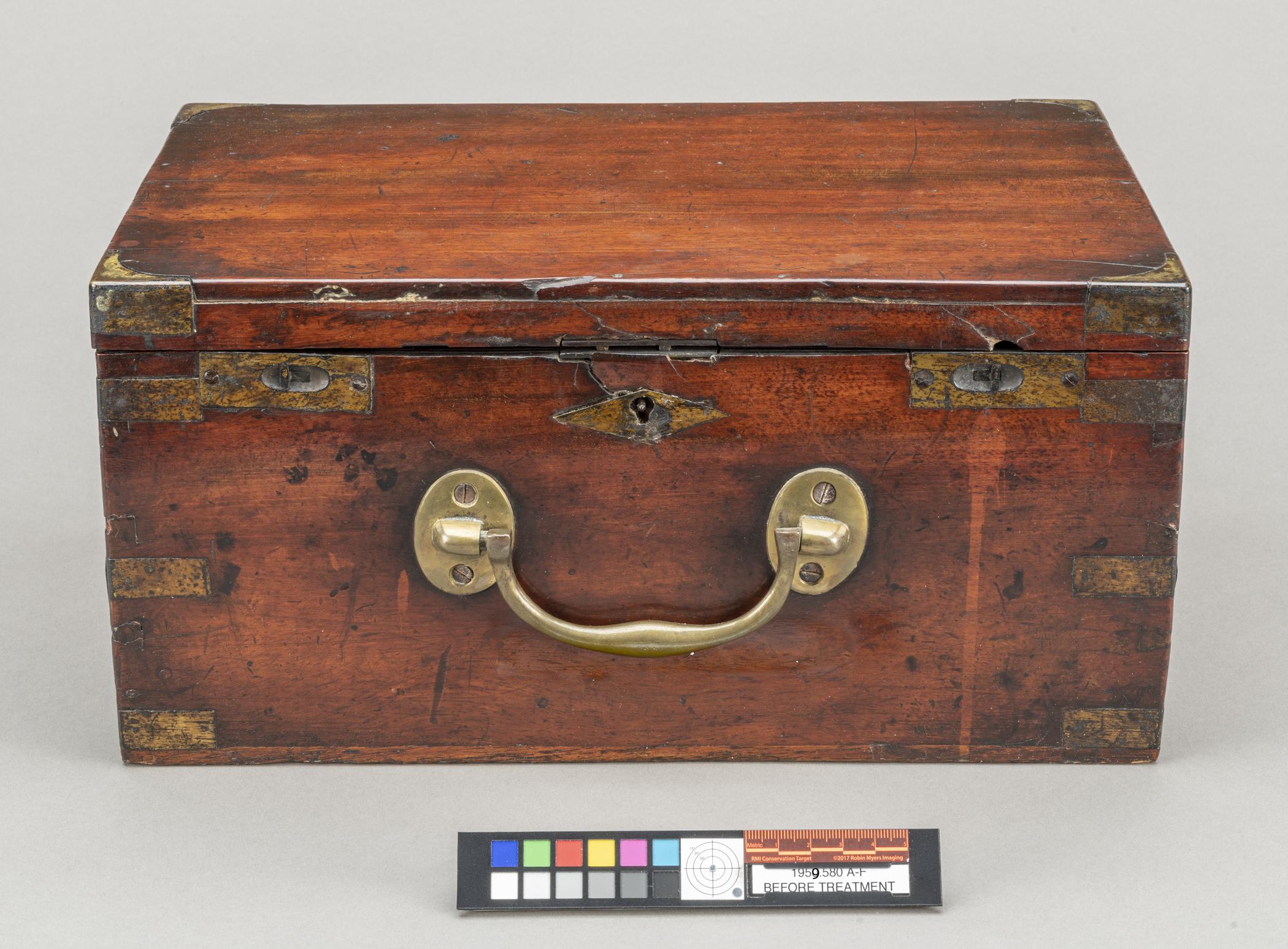 1959.0580 A Box, view 2, before conservation treatment