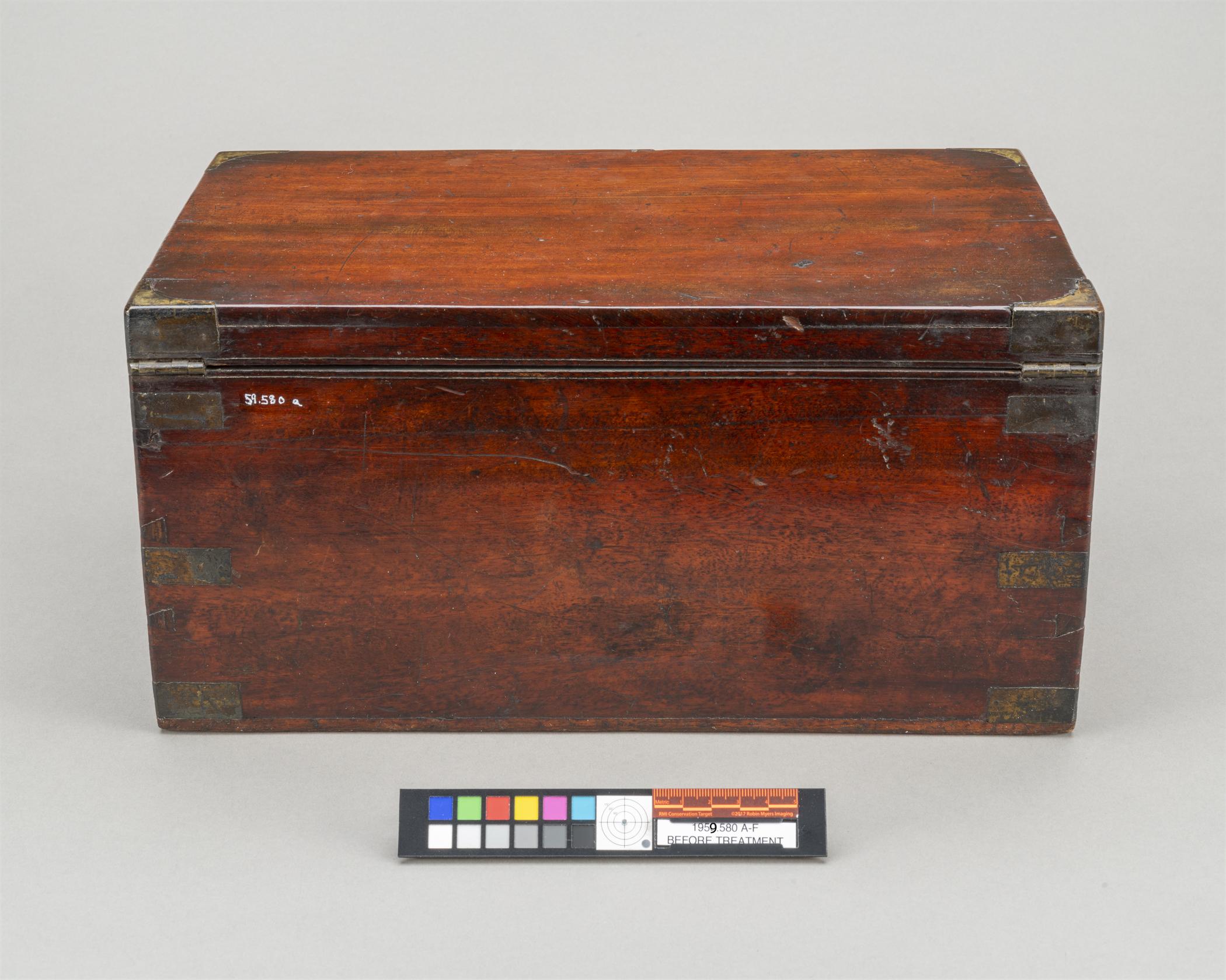 1959.0580 A Box, view 4, before conservation treatment