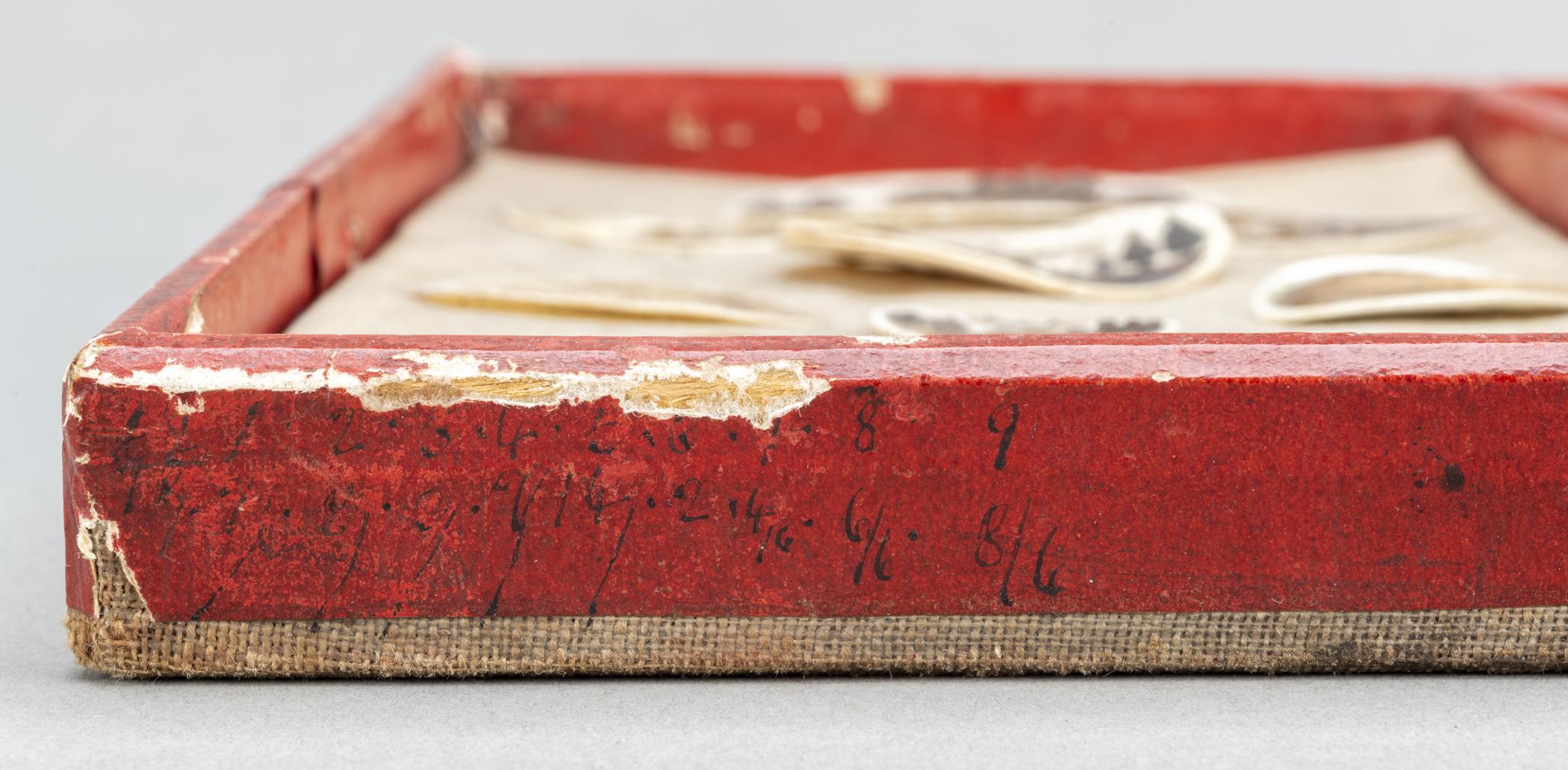 1959.0580 C Tray, detail 4, before conservation treatment