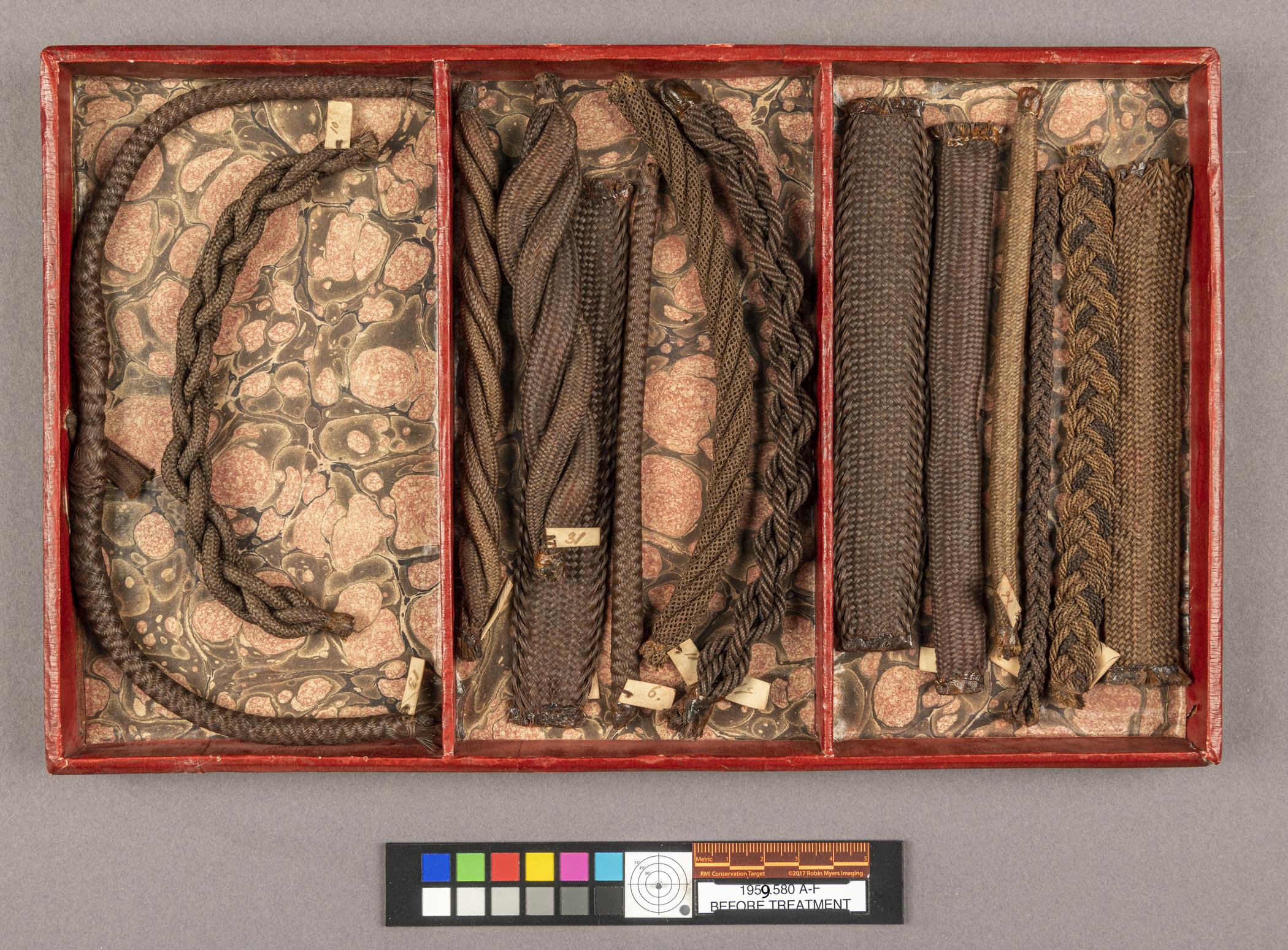 1959.0580 E Tray, view 1, before conservation treatment