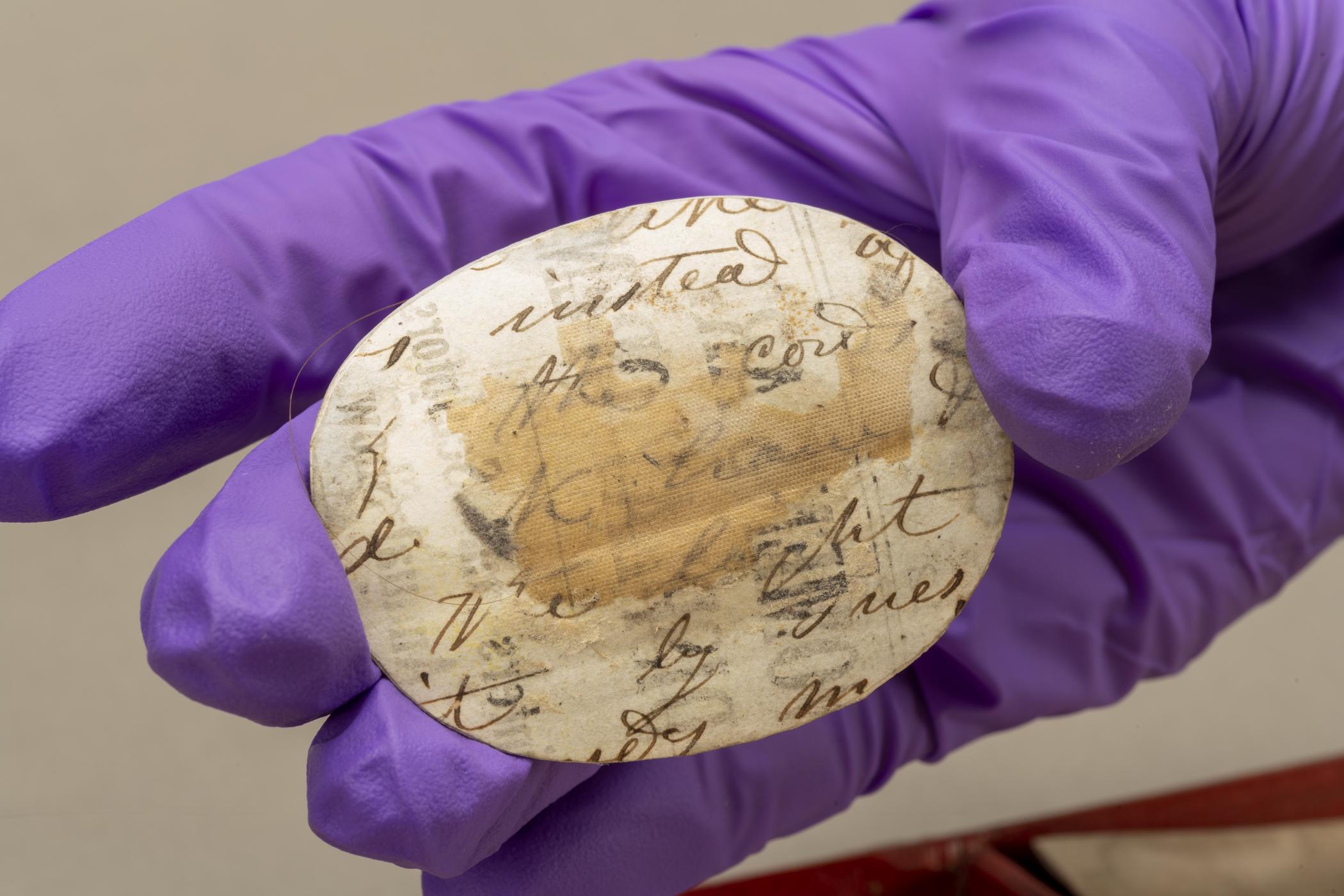 1959.0580 F Tray, detail 8, before conservation treatment