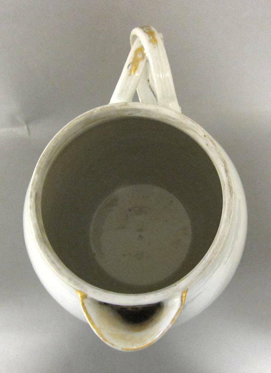 1959.0618 A Porcelain pitcher top