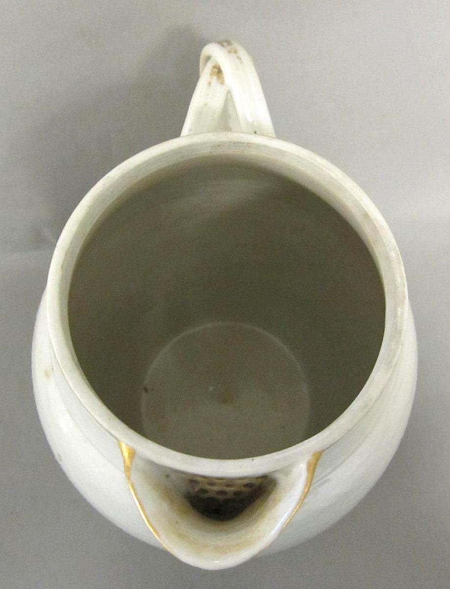 1959.0619 A Porcelain pitcher top