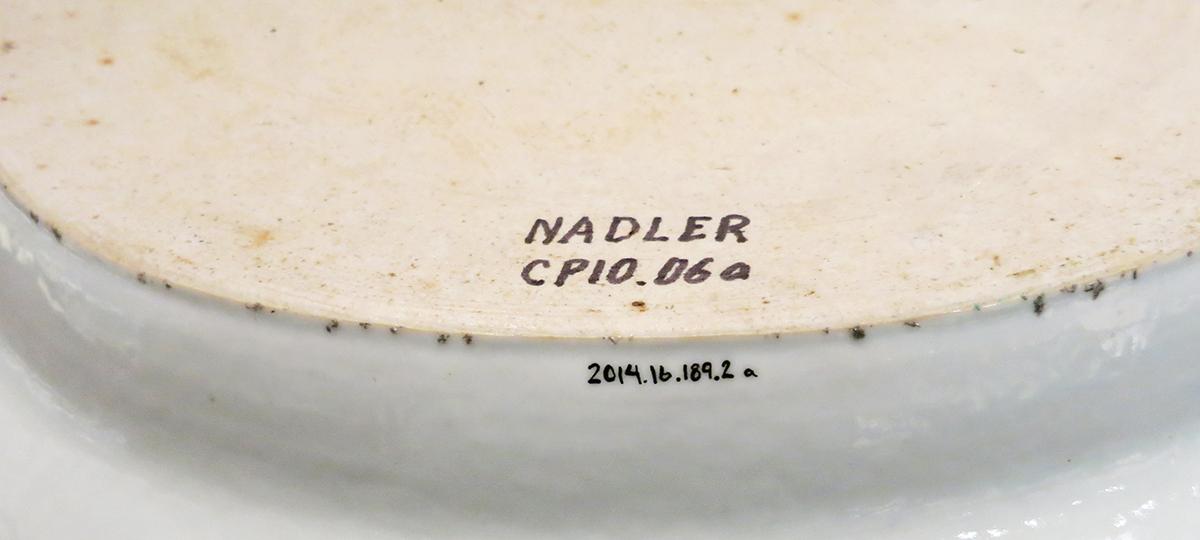 2014.0016.189.002 A Dish with mazarin (strainer) underside detail