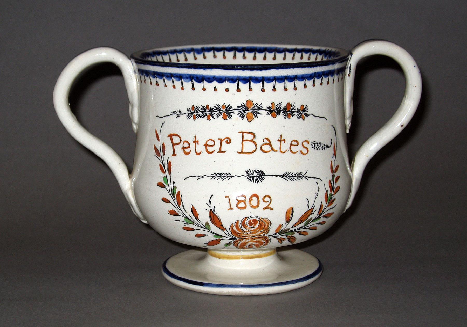 1959.0698 Pearlware two-handled cup