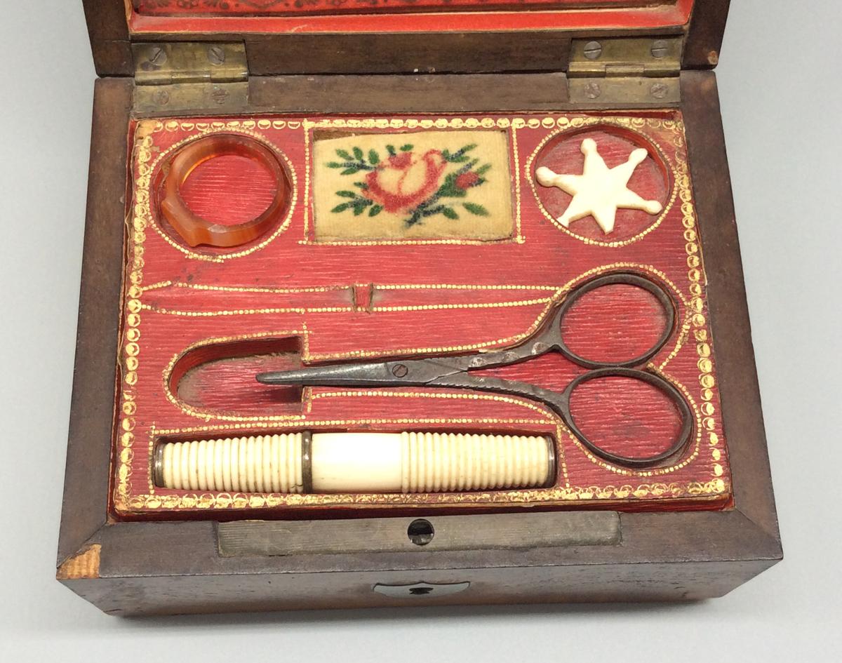 1959.0744 A-F Box; 1967.0561 Ring, view 2