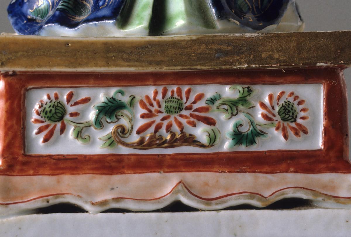 1959.0827 Figure, Woman, base detail, side 2