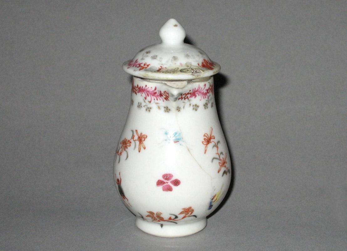 1959.0870.003 Miniature cream jug or pot front