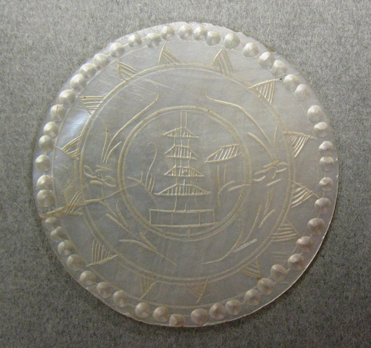 1959.0076.004 Game Counter, obverse