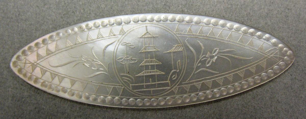1959.0076.006 Game Counter, obverse