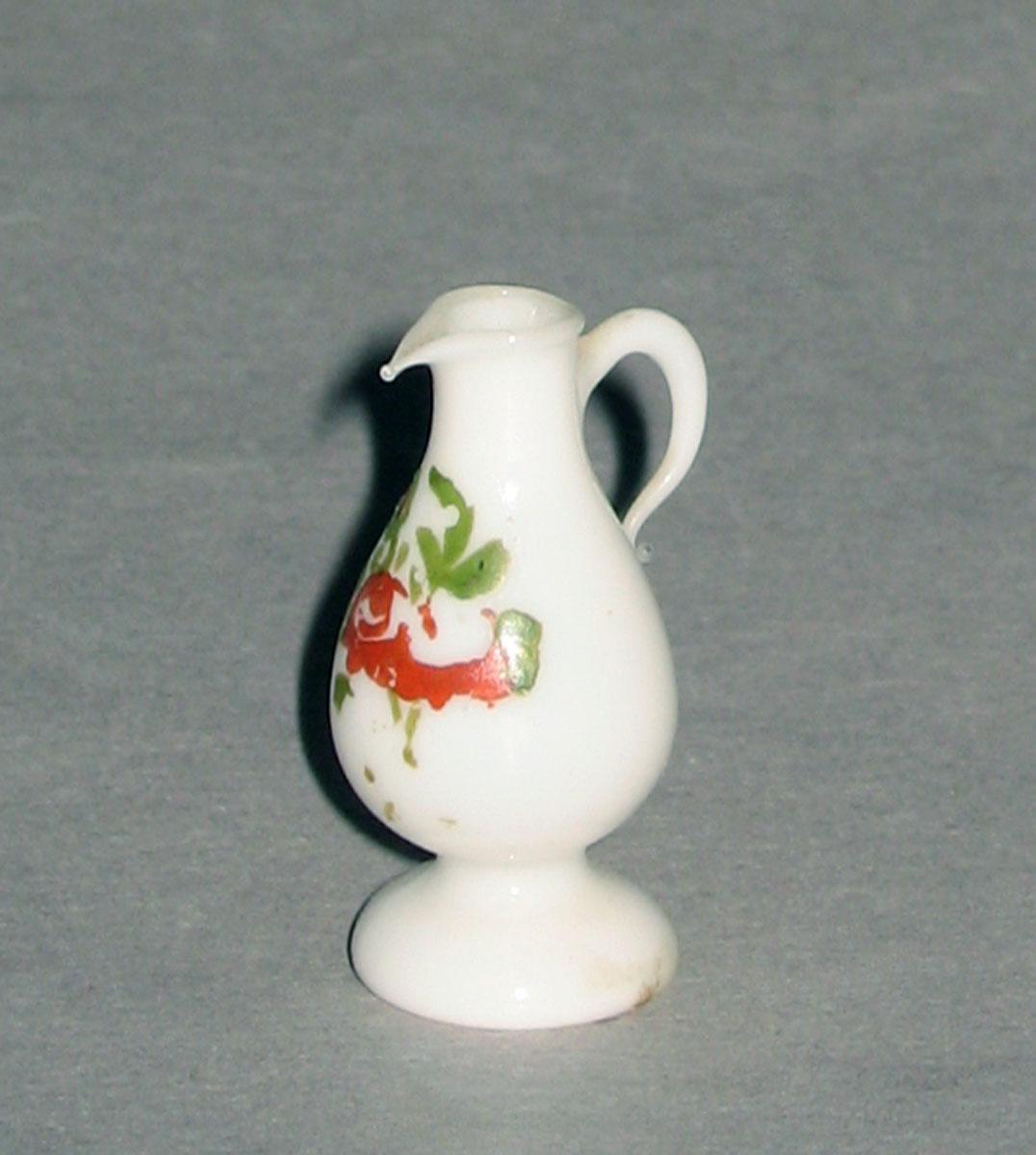1959.0998.001 Miniature glass jug