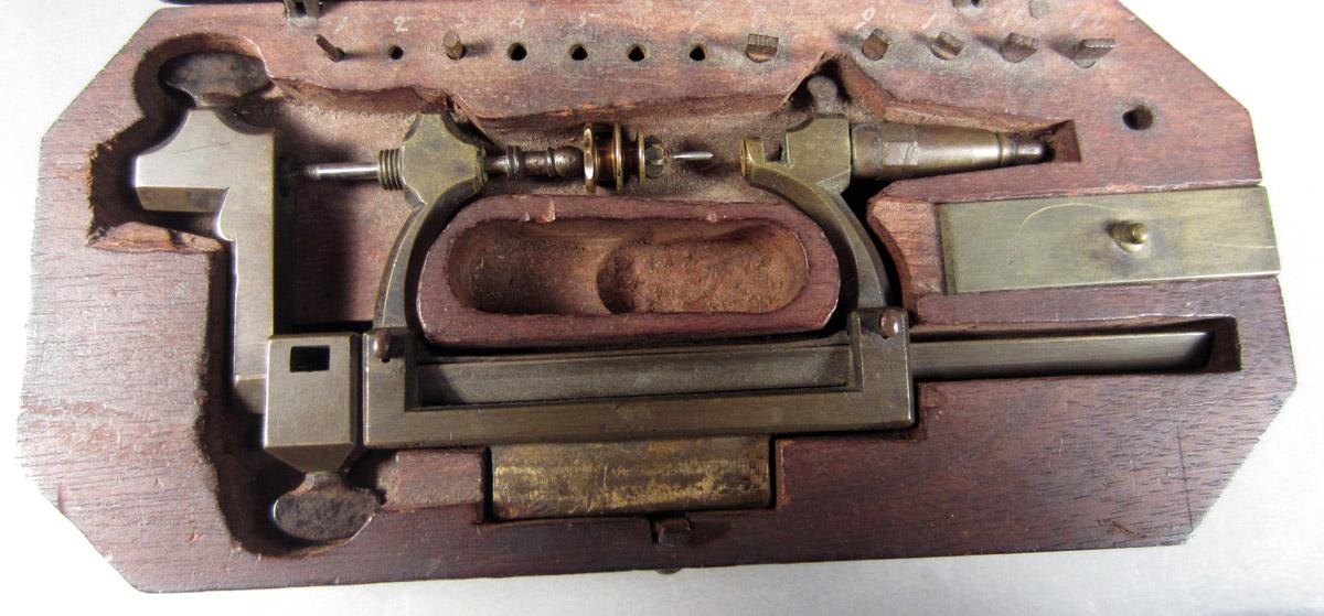 1957.0084.012 C, Watchmaker's lathe, in case 1