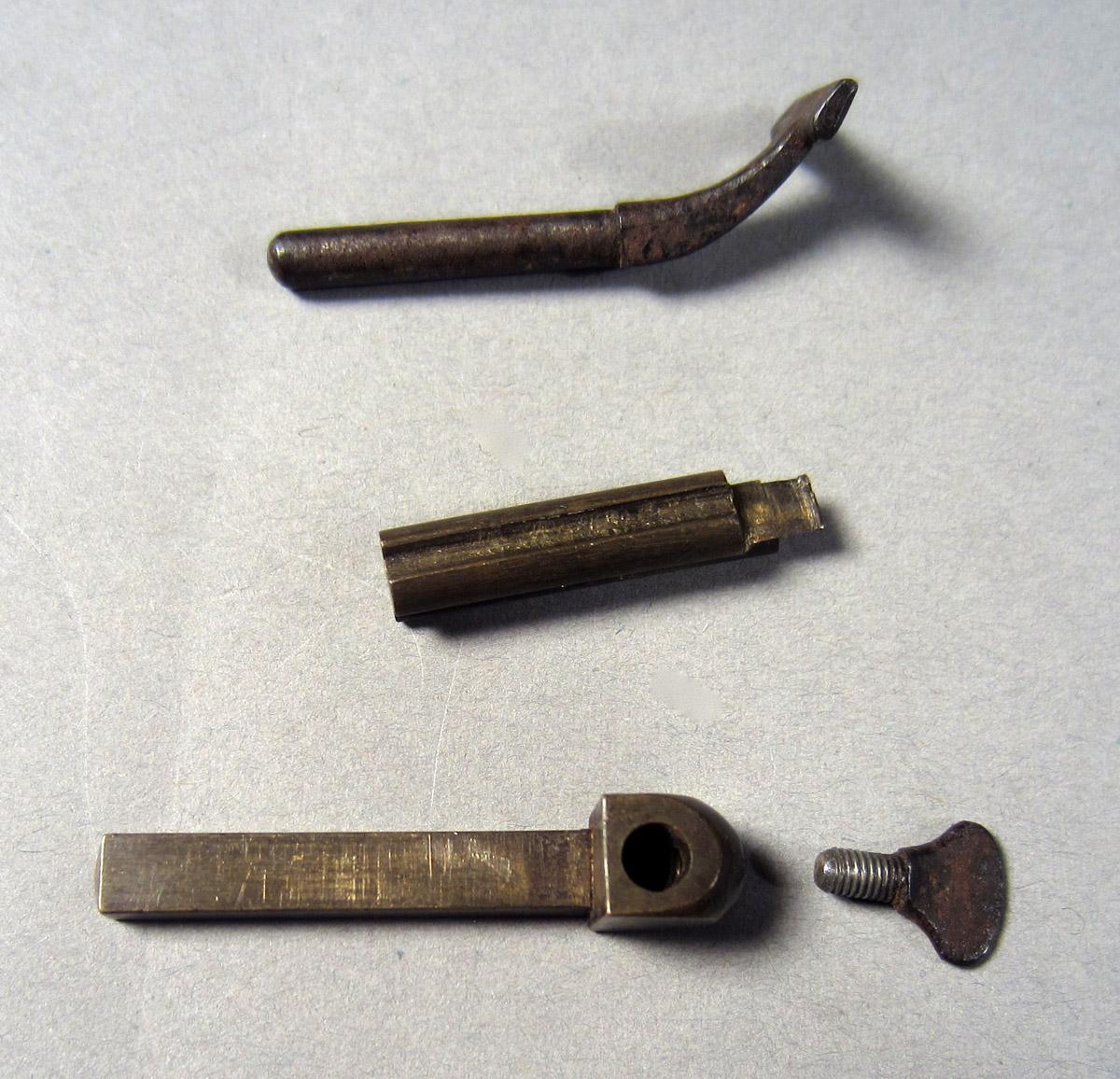1957.0084.012 C Watchmaker's lathe, Brass components