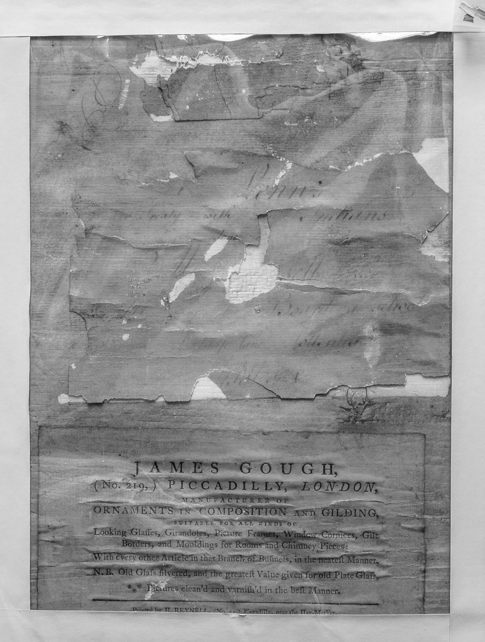 2014.0029.005 A Needlework picture, B Frame, label on backboard