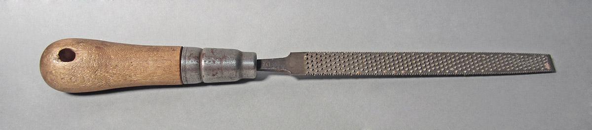 1986.0050.116, Rasp, side 1