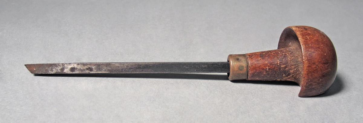 1986.0050.168, Graver, side 2