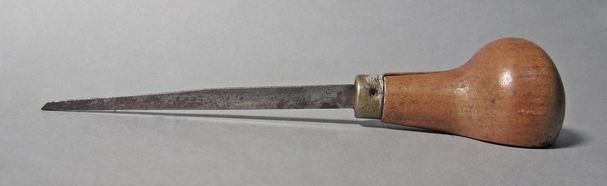 1986.0050.148, Graver, side 1