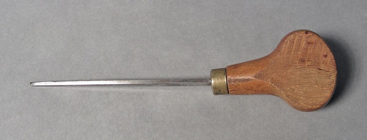 1986.0050.148, Graver, side 2