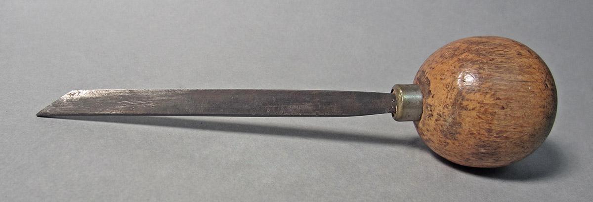 1986.0050.150, Graver, side 1