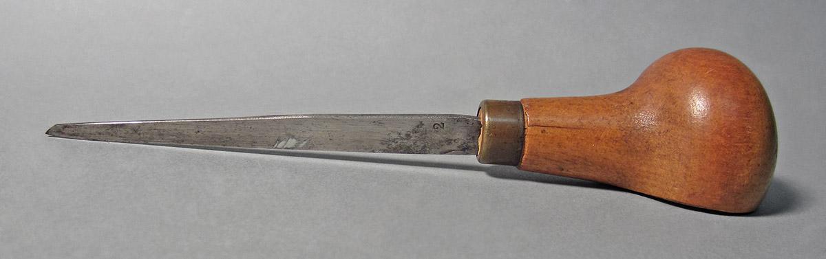 1986.0050.152, Graver, side 1
