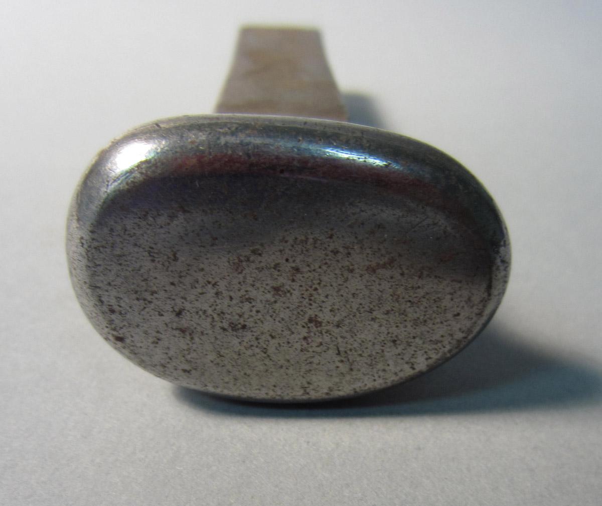 1986.0050.303 Stake, Head