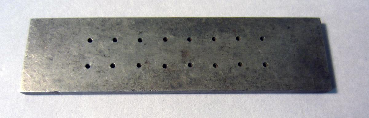 1986.0050.304 Draw plate, Underside