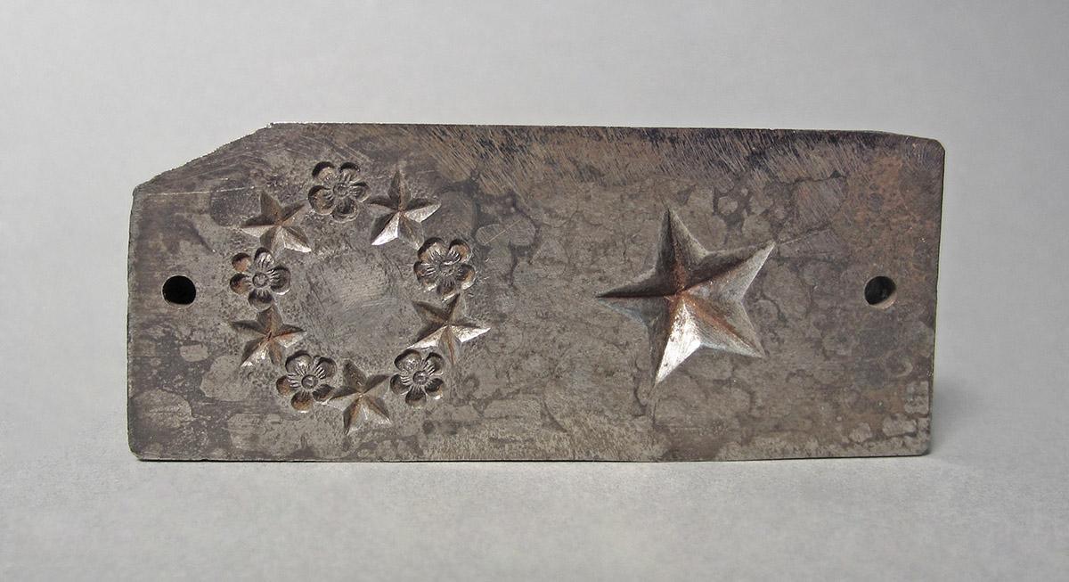 1986.0050.186, Mold, side 1