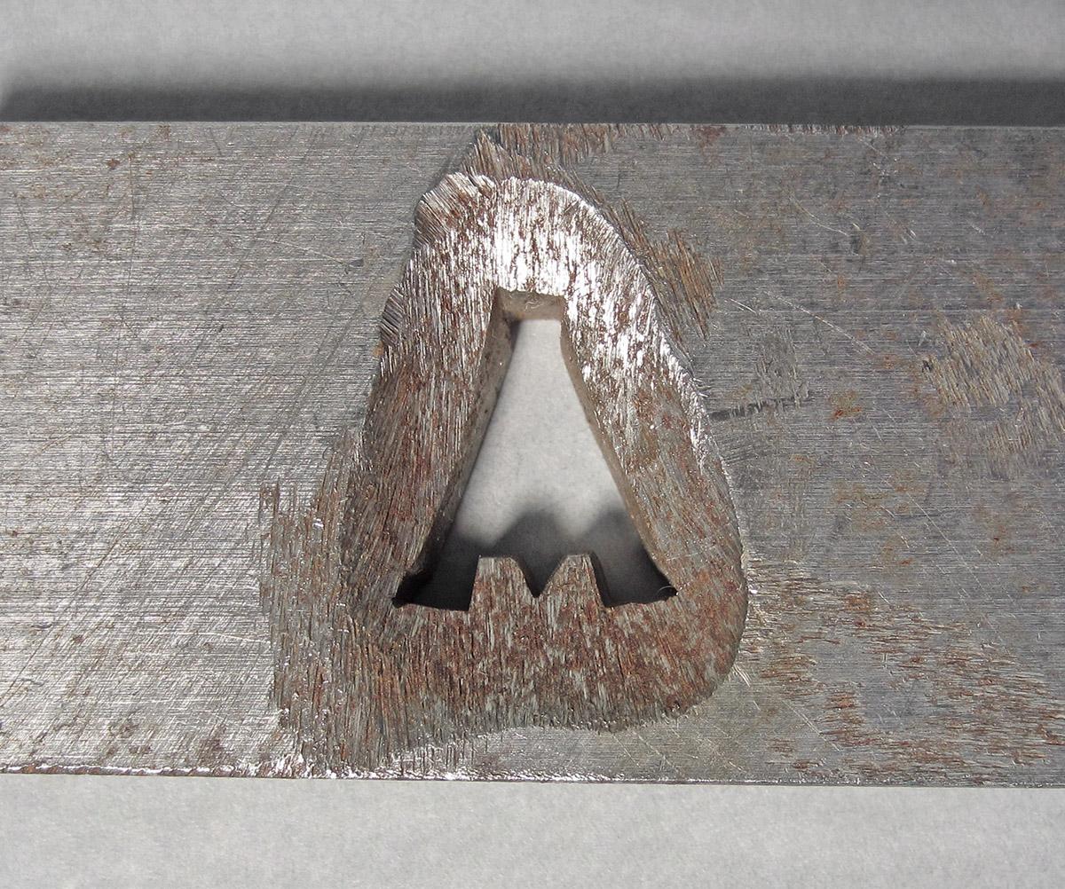 1986.0050.186, Plate, cutout detail