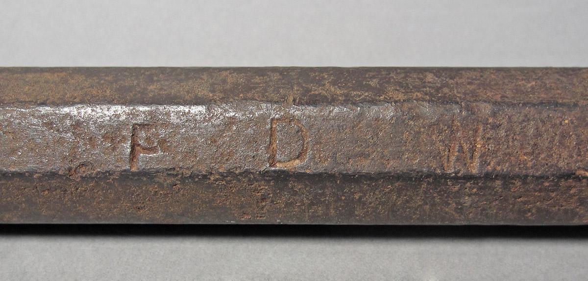 1986.0050.189, Die, mark