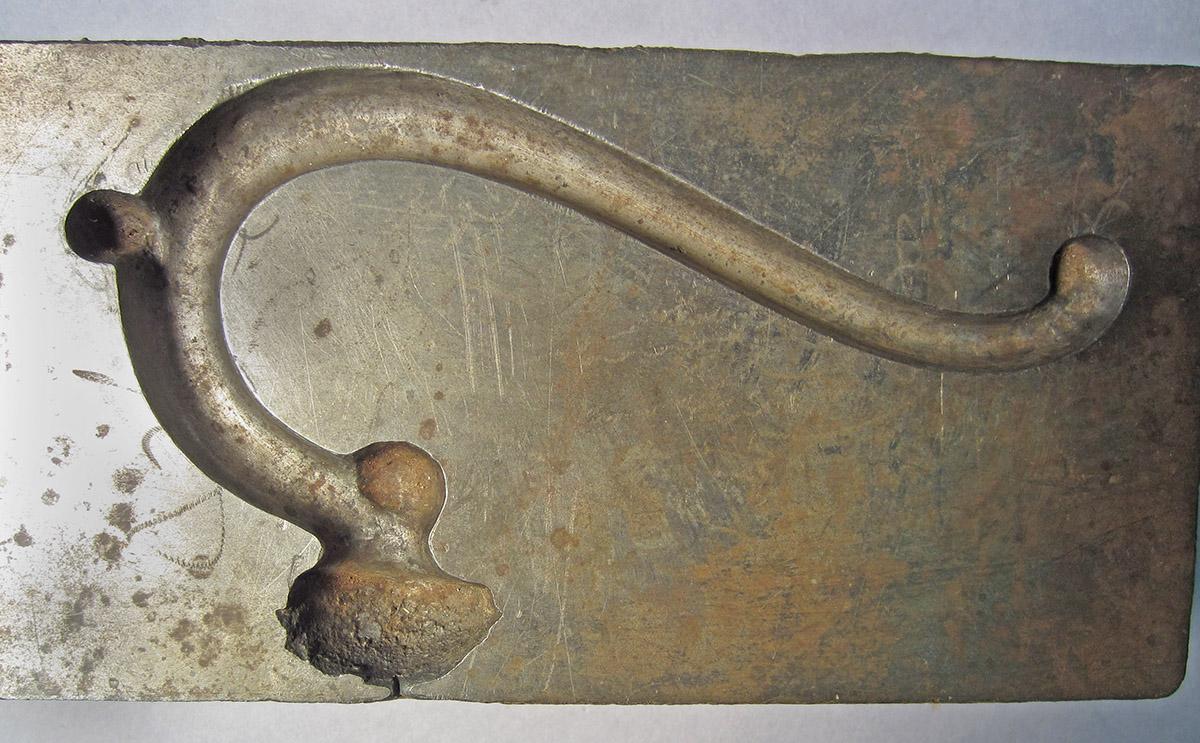 1986.0050.081, Die, mold detail
