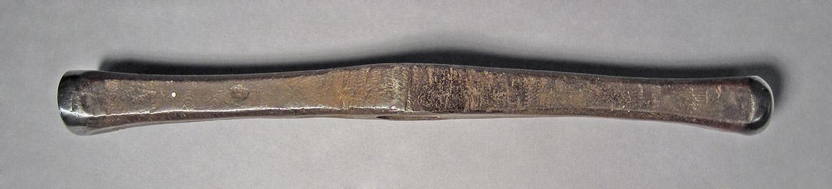 1986.0050.201, Forming hammer, side 1