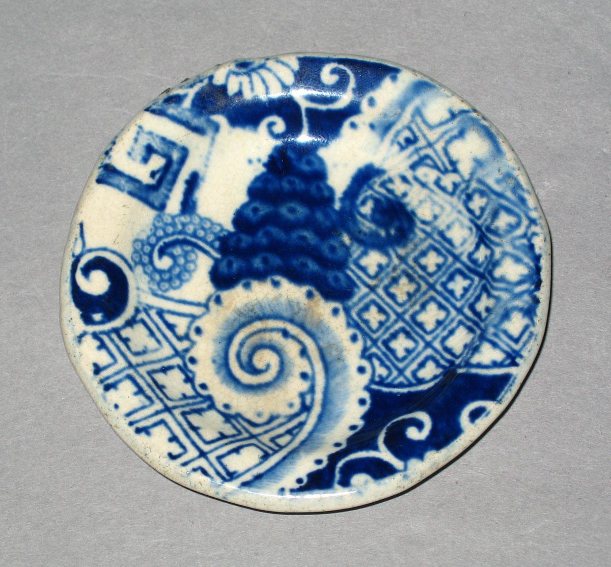 1959.1017.043 Miniature earthenware plate
