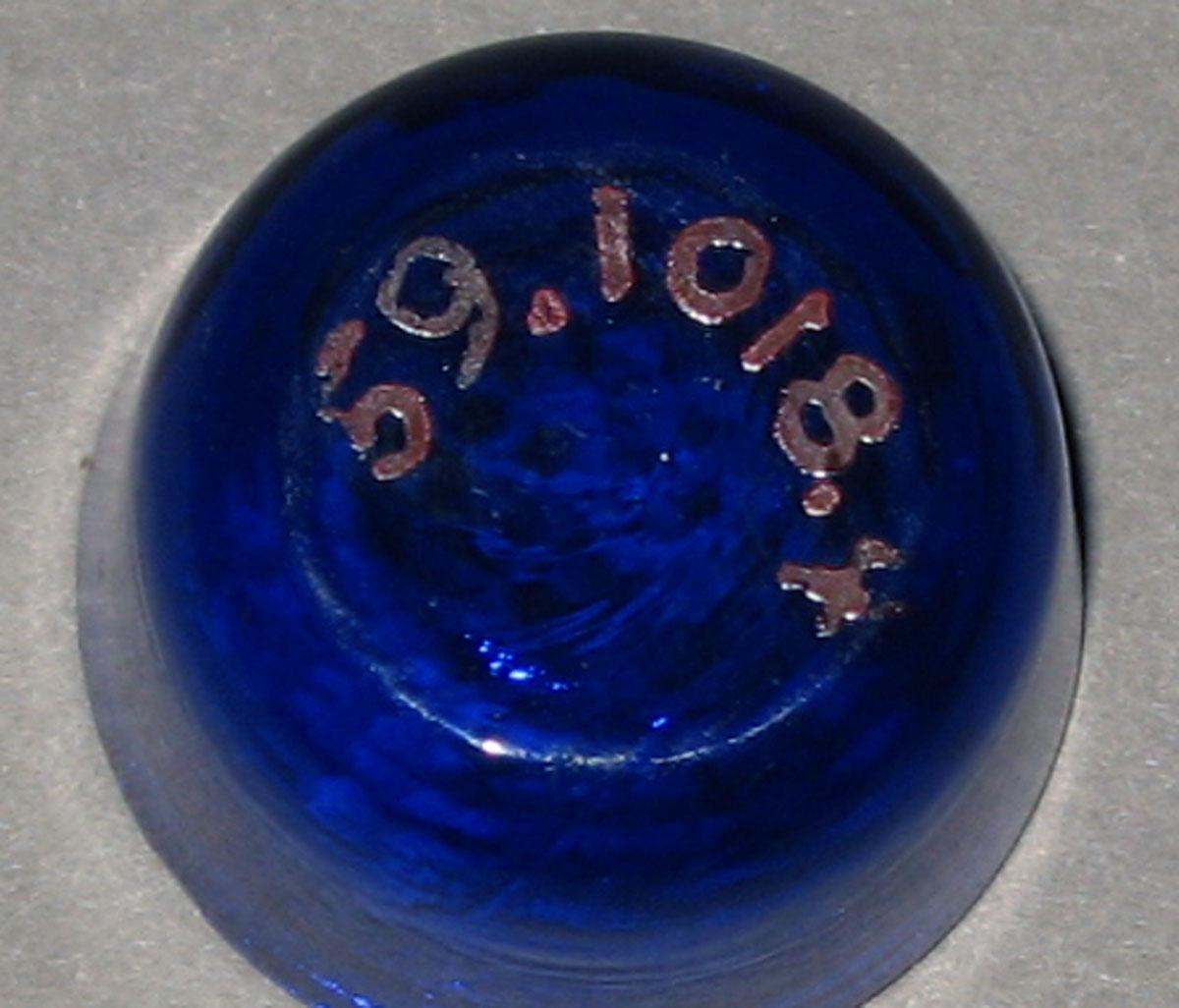 1959.1018.004 Miniature glass tumbler (underside)