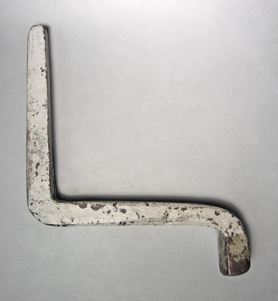 1986.0050.237, Snarling iron, side 1
