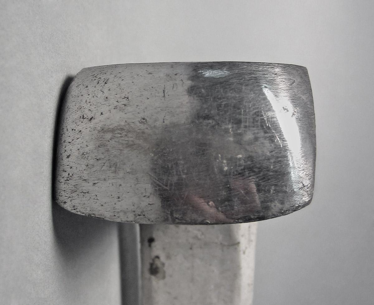 1986.0050.237, Snarling iron, head side 1