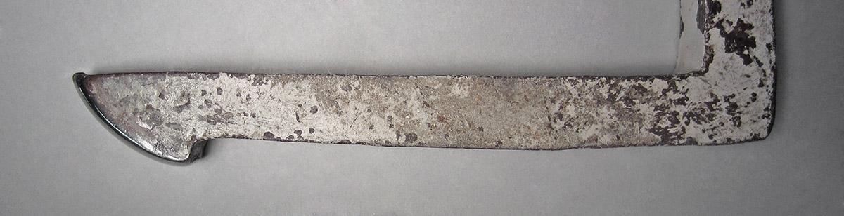 1986.0050.238, Snarling iron, end 2