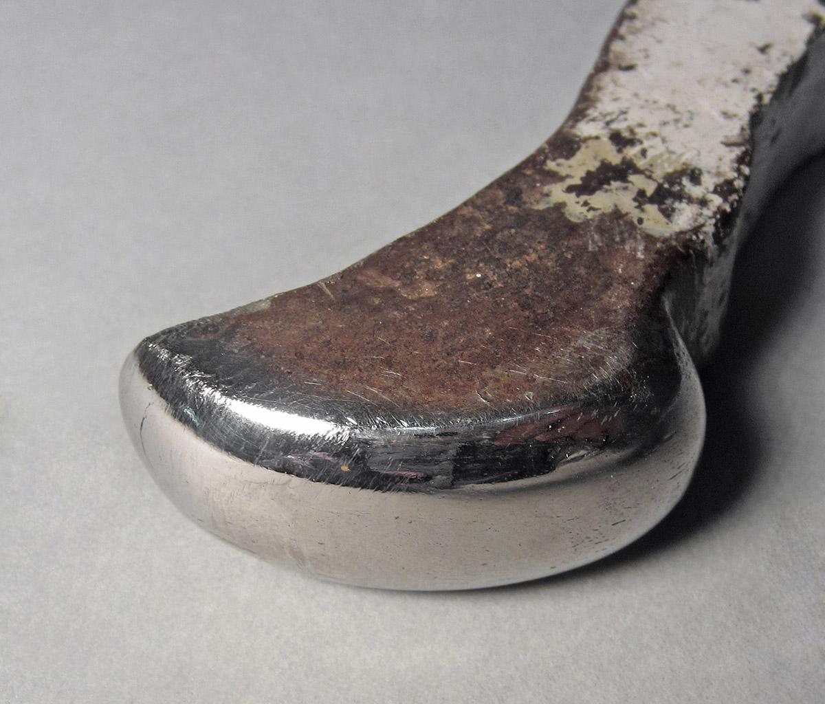 1986.0050.238, Snarling iron, head 1