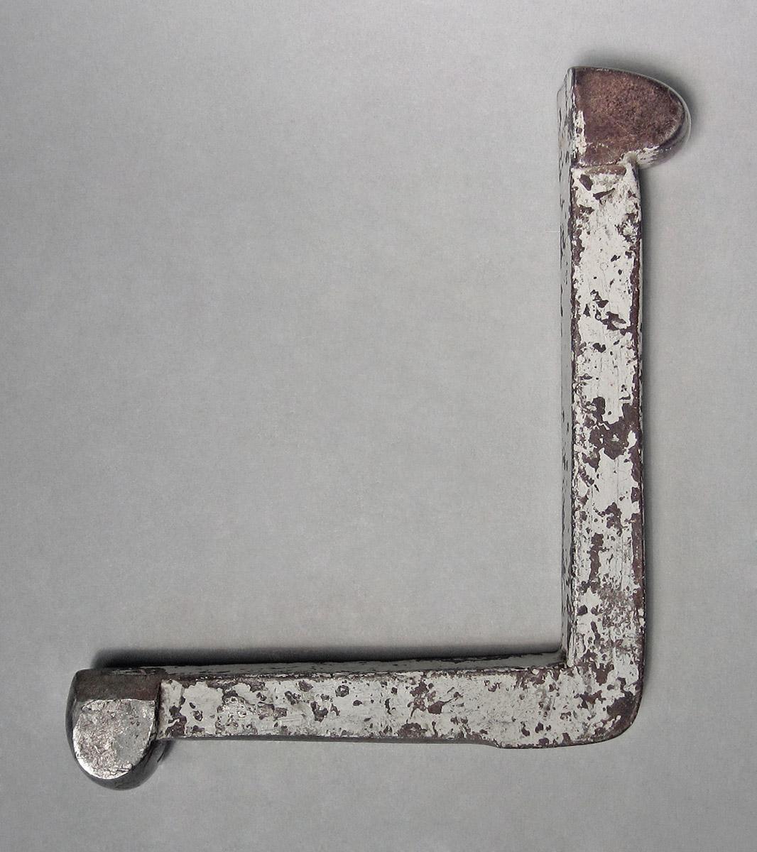 1986.0050.239, Snarling iron, side 1