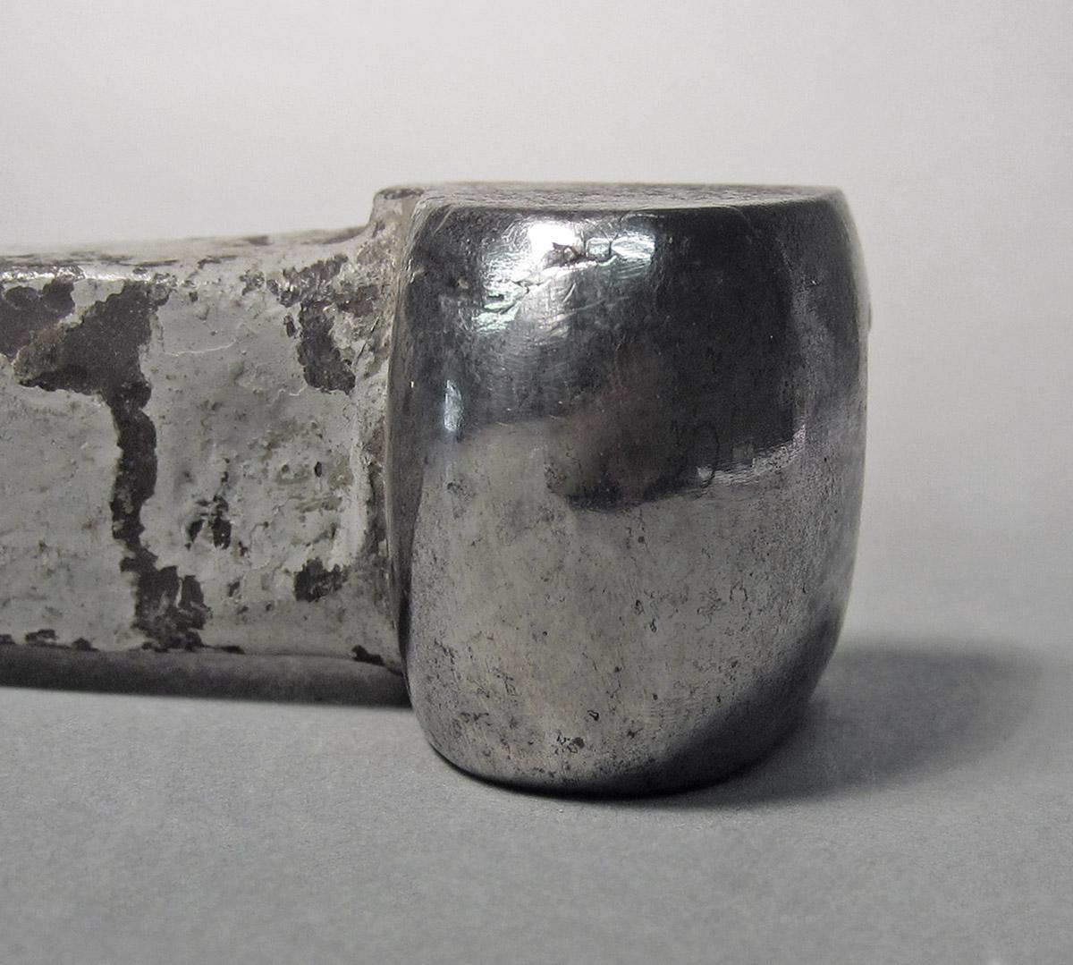 1986.0050.239, Snarling iron, head detail 1