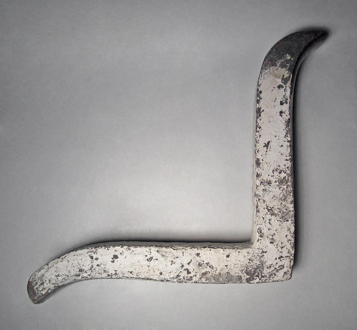 1986.0050.240, Snarling iron, side 1