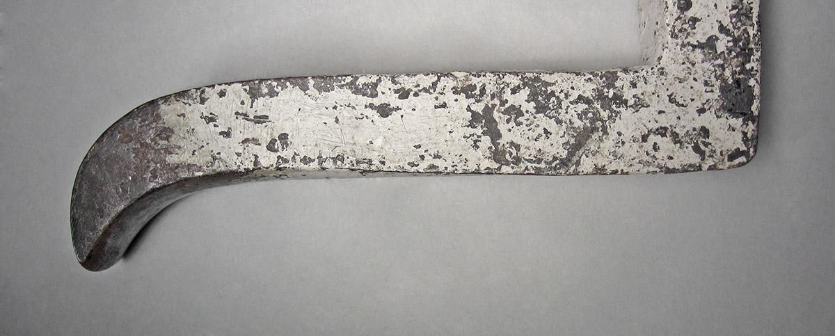 1986.0050.240, Snarling iron, end 1